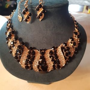 Betsey Johnson necklace and earrings